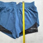 MORAJ Short running 2-en-1 turquoise/noir perforé taille S