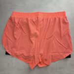 Moraj short running 2-en-1 corail perforé XL neuf