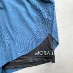 MORAJ Short running 2-en-1 turquoise/noir perforé taille S
