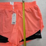 Moraj short running 2-en-1 corail perforé XL neuf