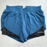 MORAJ Short running 2-en-1 turquoise/noir perforé taille S