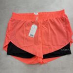 Moraj short running 2-en-1 corail perforé XL neuf